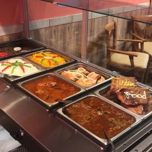 a buffet with a variety of food items