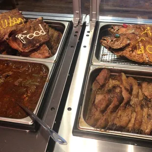 a variety of food items in a buffet