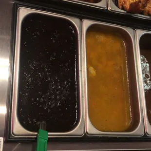 a variety of different types of soups and condiments
