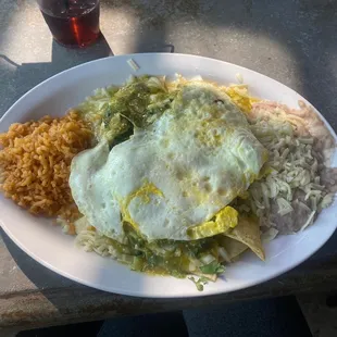 chilaquiles with eggs and chicken + refried beans