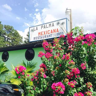 sign and flowers