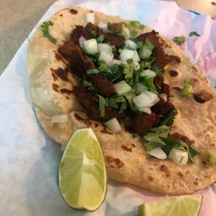 Pastor taco with onion and cilantro