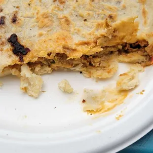 Pupusa Revuelta $4.49 [7/24]. Masa is a bit dry and thick in some areas, but the filling in the middle is plentiful. Good flavor but salty.