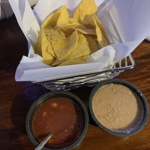 complimentary chips, salsa, and bean dip