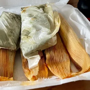 Both banana leaf and corn husk pork tamales. The banana leaf tamales are more moist, but the corn husk ones are more moist than most.