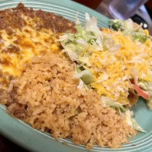 3 item plate: chicken taco, shredded beef taco, and ground beef Tacos.