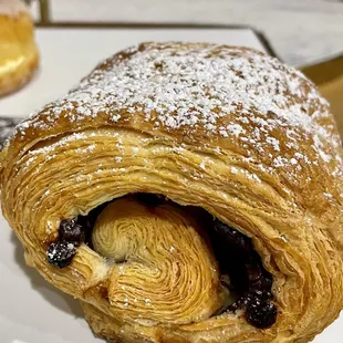 a pastry with powdered sugar
