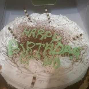 My 8 year old son could of done a better job writing on the cake. No wonder she didn't want to show me before it was placed in the box.