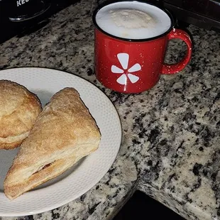 a plate of pastries and a cup of coffee