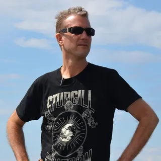J. Christopher E.