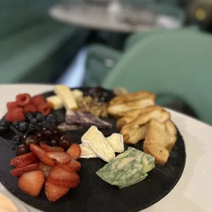 Meat and Cheese Board with no meat. They did bring another one with some ham. Mostly fruit.