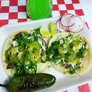Delicious tacos de cabeza  with an spicy green sauce ahhh unforgettable!!!
