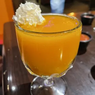 orange juice with whipped cream