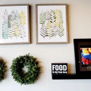 two wreaths on a wall