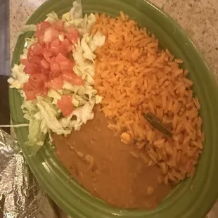 Refried beans, rice, and salad