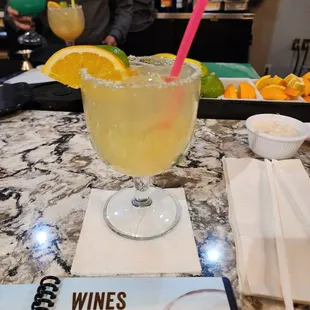 a margarita and a menu