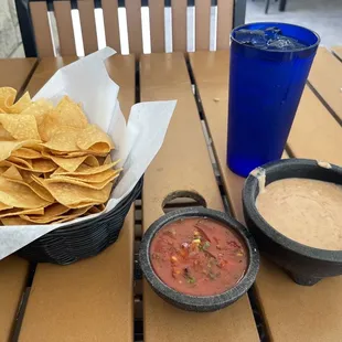 How the meal starts off (complimentary). Salsa is medium level of spice, refried beans are stove top hot, not spicy.