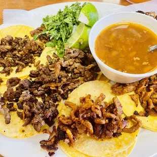 5 Taquitos half with Al Pastor &amp; half Asada with charro beans, grilled onions, cilantro &amp; lime.