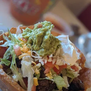 crispy taco salad bowl with beef fajita