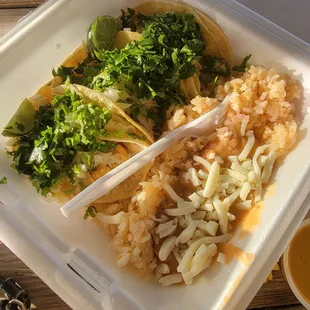 Chicken tacos beans and rice