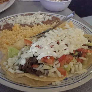 Deluxe tacos, are a little larger and have all the extras stuffed in.