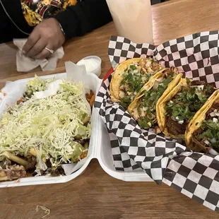 Carne asada fries and 4 tacos