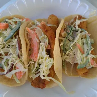 Fish tacos and a shrimp taco on the left there. I was skeptical about the sourkraut lookin stuff on top, but Oooooh it was good!