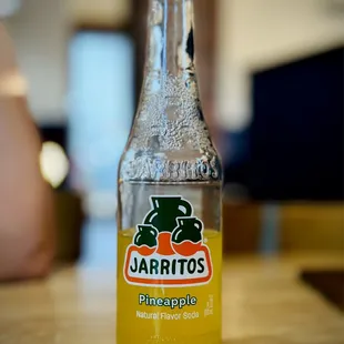a bottle of jarritos pineapple