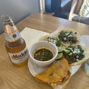 Quesabirria, carne asada, pollo, and Al pastor tacos