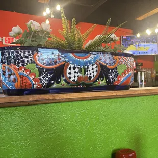 Talavera pottery, imported from Mexico, complements the decor.