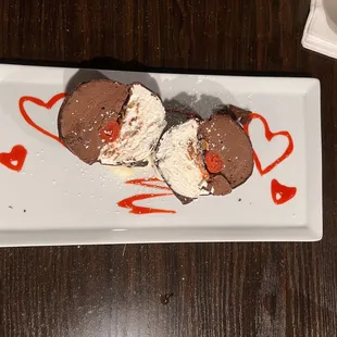 The Bomba. Chocolate and vanilla ice cream covered in chocolate with a cherry center.