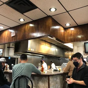 a group of people in a restaurant