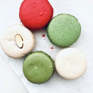 Strawberry-red, Pistachio-green, Vanilla-off white, &amp; Almond-off white with the Almond on top.