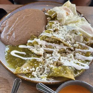 Chilaquiles verdes , eggs over easy