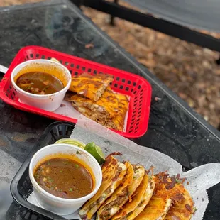 a basket of quesadillas and a basket of quesadillas