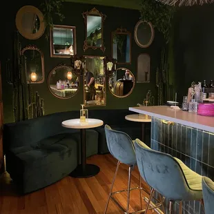 a bar with green walls