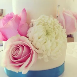 a closeup of a wedding cake