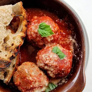 Beef &amp; pork meatballs with pomodoro sauce, parmesan &amp; country toast.