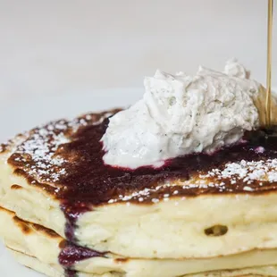 Lemon ricotta pancakes with blueberry compote, whipped creme fraiche and maple syrup.