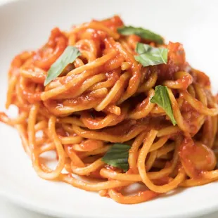 Spaghetti pomodoro with fresh basil.