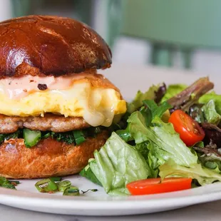 LPB Egg Sandwich with soft scrambled eggs, house-made sausage, fontina, broccolini &amp; calabrian aioli!