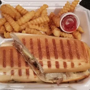 Cubano sandwich with fries.  Half for dinner, the other half for lunch at work.