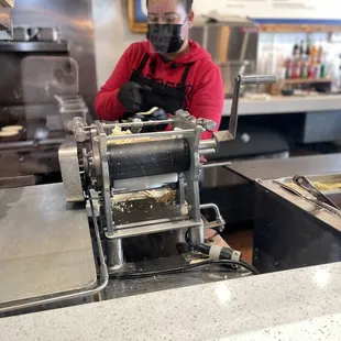 The tortillas are fresh made out of this machine.