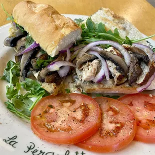 CHICKEN PORTOBELLO PANINO:
Black label grilled chicken breast, sauteed Portobello mushrooms, and arugula (add ons:tomatoes and red onnion).