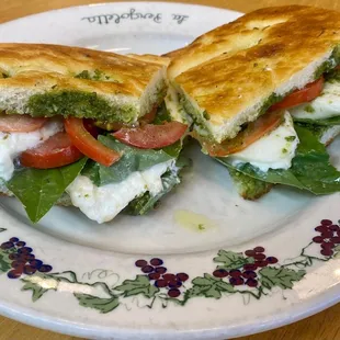 POMODORO &amp;  BURRATA on FOCACCIA:  Burrata, tomato, oregano, basil, Pesto Genovese* * Pesto contains pine nuts and walnuts!