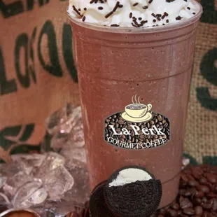 a cup of coffee and a piece of cheese