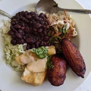 Lechon plate, yucas fritas, maduros