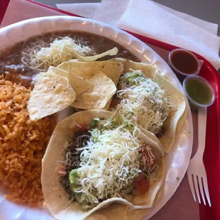 2 tacos plate: carnitas &amp; asada tacos.