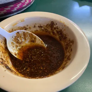 Salsa de aceite WARNING spicy but makes Menudo taste amazing.