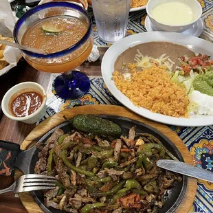 a table full of mexican food